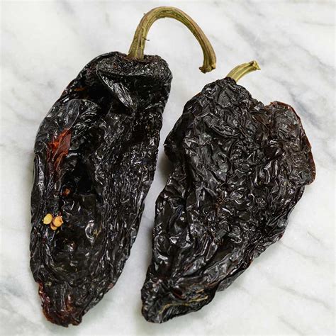 Dried poblano peppers. You can use 1/4 or 1/2 cup of water for every cup of freeze-dried peppers. Let it sit for 5-15 minutes until they become soft. The hotter the water, the faster the freeze-dried peppers will rehydrate. However, these are good to use as they are. The crunch and flavor, especially the mild ones, are great for snacking. 