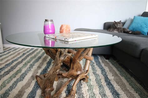 Driftwood coffee. 39.50D x 12.00H in. Melika Coffee Table, Natural Wood, Driftwood With 12Mm Tempered Glass Topby Peachtree fine furniture. $1,484. Melika Coffee Table in Natural Wood, Driftwood with 12mm Tempered Glass top. Dimensions: L 51'' x W 51'' x H 16.5''. Bellamy Coffee Table, Natural Yukasby Virgil Stanis Design. 