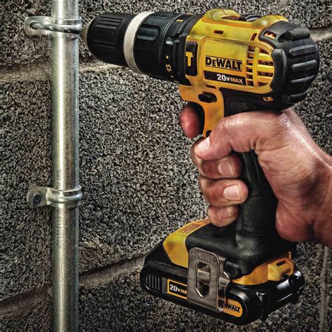 Drill hammer dewalt. The DCH133M1 18V rotary hammer drill delivers 2.6 joules of impact energy. It can be used to drill holes up to a maximum of 26mm diameter in concrete. It has a brushless motor, which delivers more power and also longer runtime. The kit includes the drill, one 4Ah battery a charger and a carry case. We suggest this tool for all … 