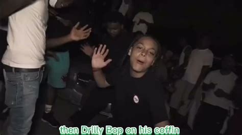 Drilly bop on his coffin. We left them boys at the bottom, that's the bottom line. [Verse 2: Rowdy Rebel] Let me tell you a story you wouldn't believe. You had to be there to see it. My lil nigga got shot in the head ... 