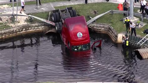 Driver escapes unharmed as truck plunges into Doral canal