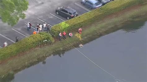 Driver hospitalized after crashing into canal in Davie