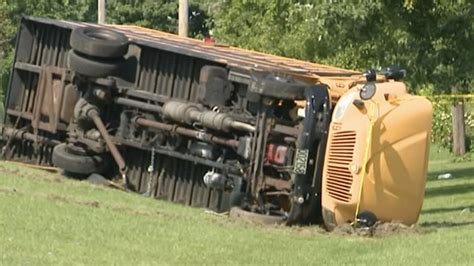 Driver of minivan facing charge in Ohio school bus crash that killed 1 student, hurt 23