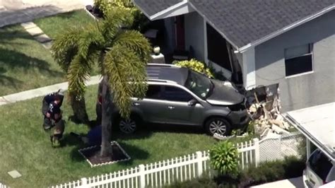 Driver transported after SUV crashes into Pompano Beach home