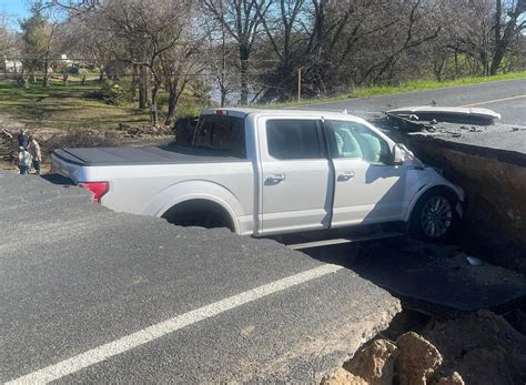 Drivers hit sinkholes after ignoring road closure signs in Adams County