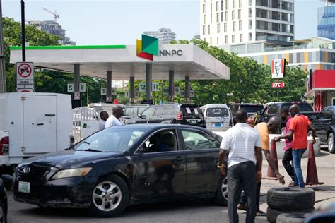 Drivers line up for gasoline across Nigeria after new president scraps fuel subsidy