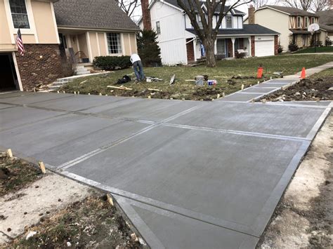 Driveway replacement. Learn how to repave your driveway, including digging out the old driveway, laying down stone for a good sub-base, grading, leveling, and compacting that ston... 
