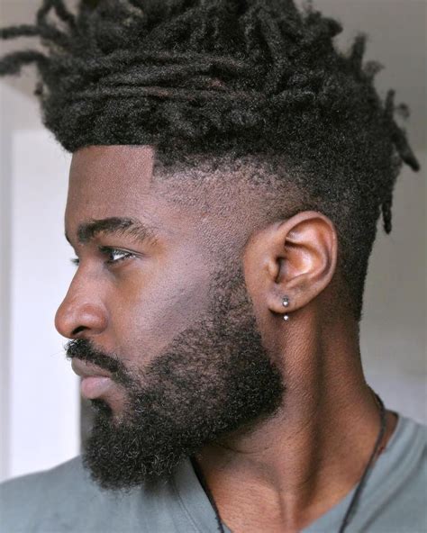 It is known as the extra short two strand twist with medium drop taper fade. This is actually a combination of three hairstyles that complement each other. 14. Freeform Dreadlocks With A Fade. Here's another popular version of the 2 strand twist dreads; this top head freeform dreads with a high bald fade haircut.