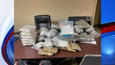 KNOXVILLE, Tenn. (WVLT) - A Knoxville man was arrested Saturday after officers found weapons, several pounds of drugs and more than $64,000 in his home, according to an incident report obtained by WVLT News. The search began when officers responded to a home on Huntwood Lane around 4:30 p.m. looking for a wanted fugitive, Ricky Joe Lee.. 