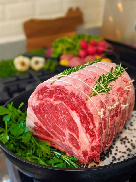 Dry aged prime standing rib roast. Place the prime rib roast on the tray and air fry at 400°F for 8 minutes to sear the roast and lock in the juices. Then, lower the temperature to 300°F and air fry for 70 minutes. Check the internal temperature every 20 minutes using a meat thermometer. 