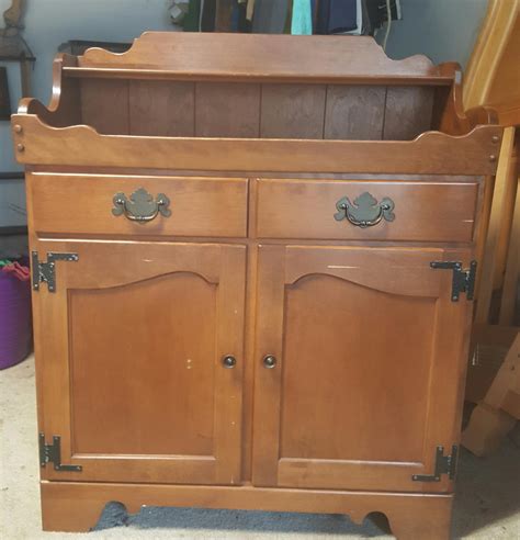 Dry sink cabinet. Black Distressed Vintage Dry Sink Cabinet (Sold $525.00). A dry sink that is old is an antique dry sink.A dry sink is more precisely a modern sink that lacks the comfort of indoor plumbing. Rather, it is a piece of furniture that is used to contain a … 