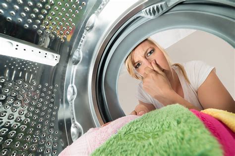 Dryer smells like burning. Remove the front panel or cabinet to inspect the belts to see if they are worn out or broken. The belts are normally located at the bottom of the washing machine and if they are worn will typically cause a burning smell or create a noise when the washer is running. Ensure that the transmission drive pulley turns freely and that both the motor ... 