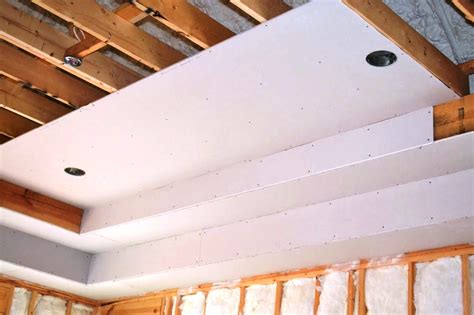 Drywall ceiling. The national average drywall ceiling installation is between $400 and $1,200. Most homeowners spend $700 to install ⅝-inch fire-resistant drywall ceiling in a 280 sq.ft. living room. At the low end of the spectrum, you can spend $60 to install ½-inch standard drywall ceiling in a 40 