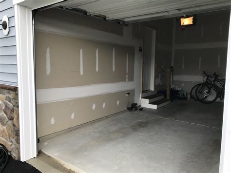 Drywall garage. This drywall is harder to cut and work with than regular drywall, and it's normally used in garages and apartment buildings when it is required by building codes. Prices for fire-resistant drywall typically range from $20 to $30 for a 4- by 8-foot panel. Basics of Fire-Rated Type X or C Drywall. 