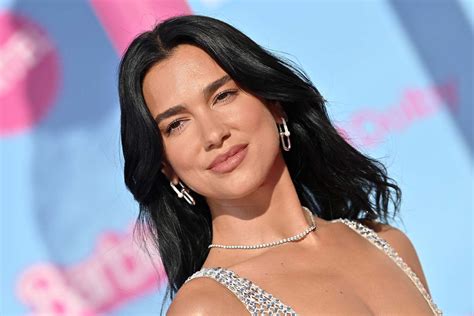 Dua Lipa stuns in tiny floral bikini on luxurious island vacation in ...