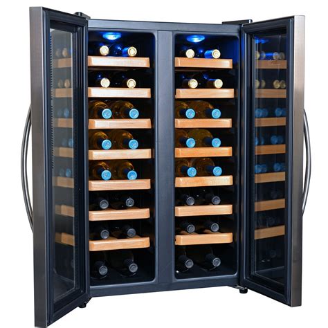 Dual zone wine fridge. This item: SCHMECKE 33 Bottle Dual Zone Wine Cooler Refrigerator w/Lock | Large Freestanding Wine Cellar | 41f-64f Digital Temperature Control Wine Fridge For Red, White, Champagne or Sparkling Wine - Black . $399.99 $ 399. 99. Get it … 