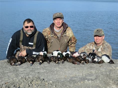 Almost 10,000 acres adjoining the Wildlife Refuge. Black ducks, woo