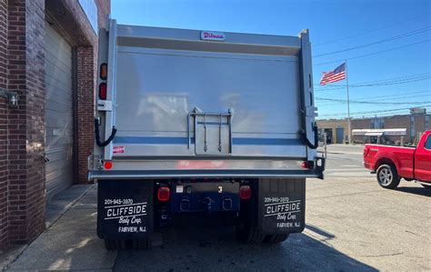 Dump body coal chute.  Features: 17 ft.  Durable carbon steel construct...