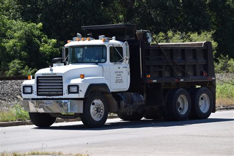 Dump truck business. Our fleet consists of 20 trucks and trailers that include 12 yard tandem dump trucks, as well as tractor trucks with belly dump, end dump, and demolition dump ... 