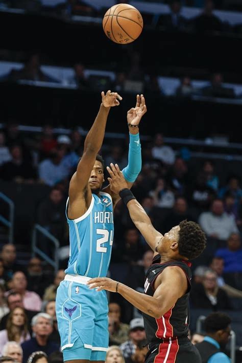 Duncan Robinson leads balanced scoring attack as Heat hold on to top Hornets 116-114