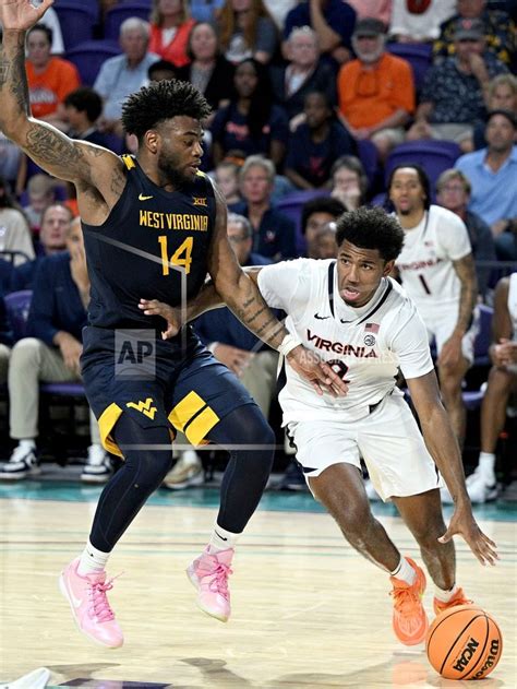 Dunn and Beekman power No. 24 Virginia past West Virginia 56-54 at Fort Myers Tip-Off
