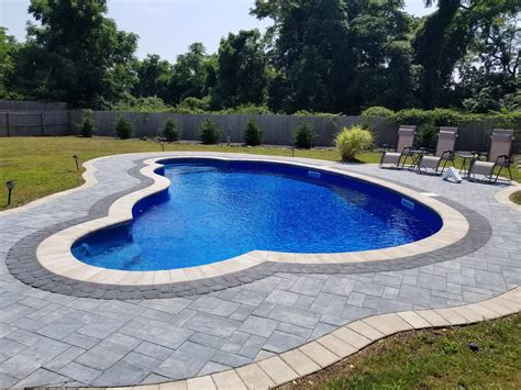 Dunrite pools. A semi-inground pool costs $7,000 to $25,000 installed on average. The cost of semi-inground pool materials is $2,000 to $15,000, while the labor cost for semi-inground pool installation is $2,000 to $10,000. Semi-inground pools are ideal for sloped yards but not as customizable or long-lasting as fully inground pools. Semi-inground … 