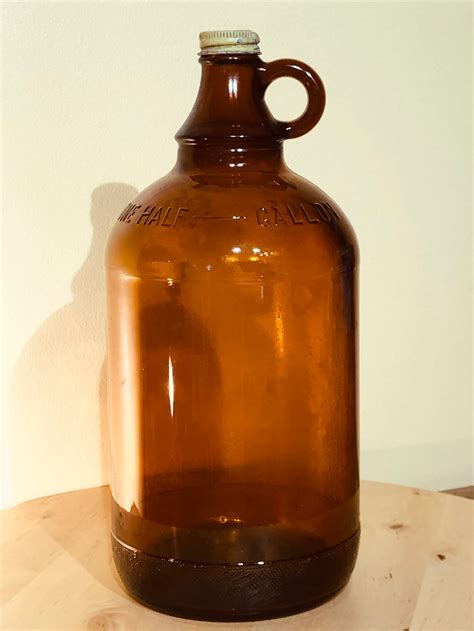 Vintage One Gallon Clear Glass Jug Duraglas Large Owens-Illinois Glass Company 1940s 1950s No Cap Home Decor Kitchen Iridescent (7.6k) $ 34.99 ... 1/2 Gallon Jug w/Pump | Perfect for Detergent, Softener, Syrup, Brewing | Clear or Amber Half Gallon Bottle with Black or White Pump. 