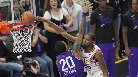 Durant scores 38 and Booker has a career-best 15 assists to boost the Suns past the Jazz