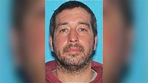 During manhunt for suspect in Maine shooting that killed 18, authorities twice converge Thursday on his last known residence