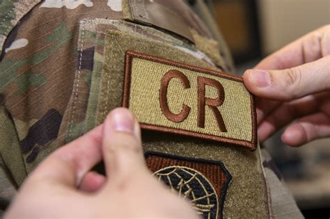 2.3.7. A morale patch may be worn on the OCP on Fridays only. Morale patches must be in good taste and formally approved by the Squadron commander. Morale patches will only be worn in place of the unit/squadron patch. Duty identifier tabs and any other patches/tabs not specifically authorized by this instruction are not authorized for wear.. 