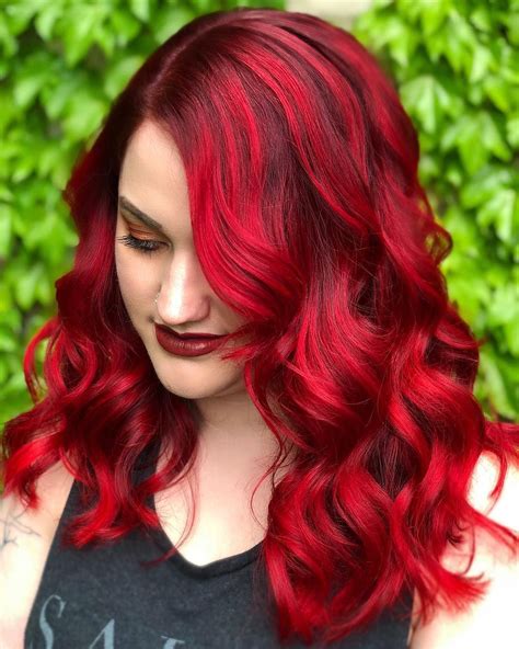 Dye red hair. The vivid cherry red hair dye was applied in a balayage style over naturally chocolate brown hair for a gorgeous yet low-maintenance look that can save you those salon visits. @frances_hairartist. 39. Purple Red Hair Cascade. I love a proper color melt, like this cascade of cool red hair shades. The roots begin in a … 