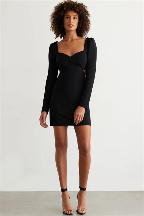 Dynamite black dress long sleeve.  Form-fitting and stylish.  Sold by w...