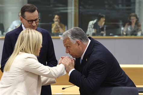 EU leaders pause talks as Poland and Hungary’s anti-migrant governments block progress