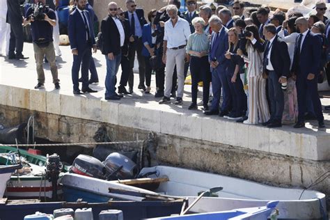 EU pledges crackdown on ‘brutal’ migrant smuggling during visit to overwhelmed Italian island
