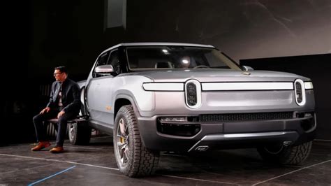 EV maker Rivian prices IPO above range to raise over $11.9 bln