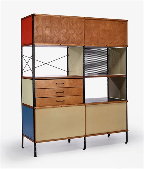 Eames storage unit. In 1949, Charles and Ray Eames developed a new system of free-standing multifunctional shelves which - similar to the Eames House that dates from the same time – were constructed strictly in keeping with the principles of industrial mass production: the Eames Storage Units (ESU) and the Eames Desk Unit (EDU). Materials 
