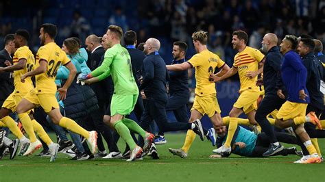Early end to Barcelona’s title celebrations after Espanyol fans invade pitch
