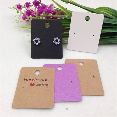 Earring cards. Earring Cards by: Catherine. Jean, You don’t have to purchase the plastic pieces for the back. You can design your business card/earring card so that the top 1/2 inch folds over. This allows you to lay it on a table and it … 