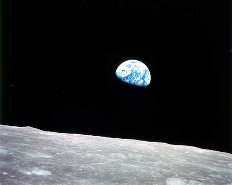 Earth on the moon. The Moon is tidally locked with Earth, which means that it spins on its axis exactly once each time it orbits our planet. Because of this, people on Earth only ever see one side of … 