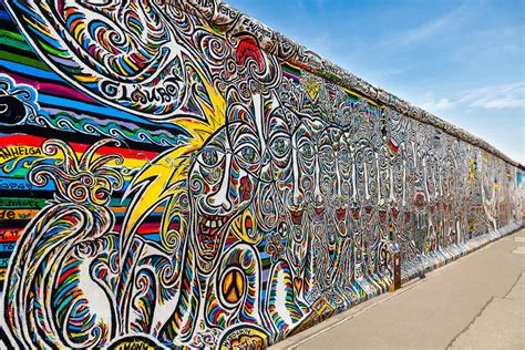 The East Side Gallery is the largest open air gallery in the world. In the period from February to September 1990, 1316 meters of the Berlin Wall in the East Berlin Mühlestraße were painted with images. More than 118 artists from 21 countries created 106 unique motives, ...