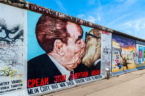 East wall gallery. The East German military built the Berlin Wall after World War II to prevent the migration of civilians to the Allied West. Many Eastern Germans did not want to live under their co... 