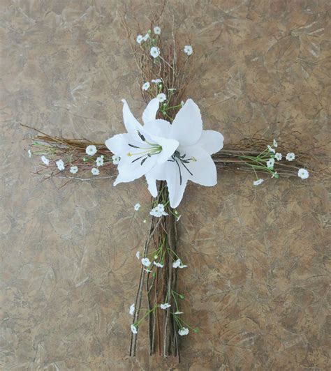 "This beautiful cross wreath door hanger will be the perfect addition to your Easter and Home Decor. Built on a cross frame, this hanger measures 20\"x14\". ... Easter Wreath Diy. Easter Altar Decorations. $65.99. Faux White Lily Easter Cross Door Hanger , Christian wall and door decor , Easter porch decor. Etsy. Floral Door Wreaths.. 