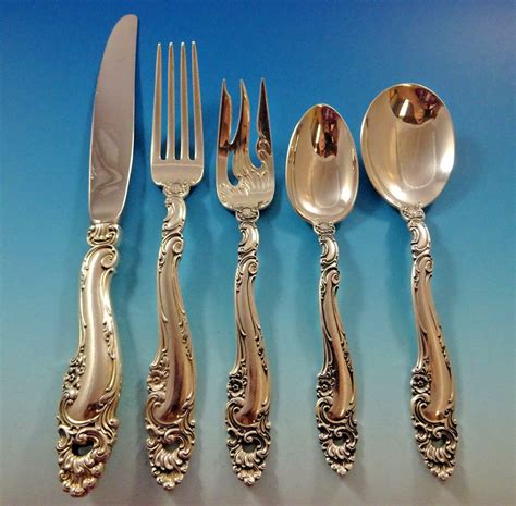 Was: $189.99. $8.50 shipping. Wallace Grande Baroque Sterling Silver Flatware 60 pc. Service For 12. $2,699.99. $49.99 shipping. . 