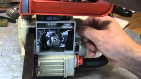Echo chainsaw carb adjustment. Start the engine on a solid level surface and run at a fast idle until warm. Hold the saw firmly by the handles and accelerate the engine to a fast idle. Slowly operate the chain brake lever while holding the saw firmly on the ground. When the brake lever trips, the chain should stop. 