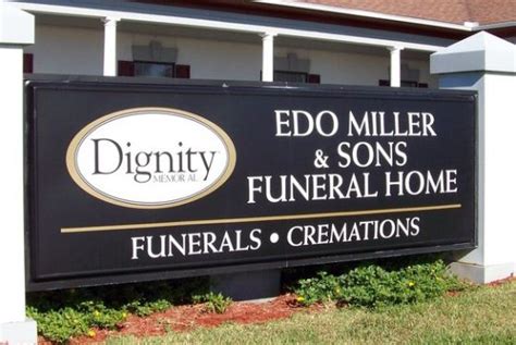Edo Miller and Sons Funeral Home. John Staten Smith