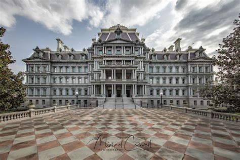 Eeob building. The Eisenhower Executive Office Building is a beautiful U.S government building situated west of the White House and was designed by Alfred. B Mullet. B Mullet. This building expands across 5 acres and is a sight to behold. 