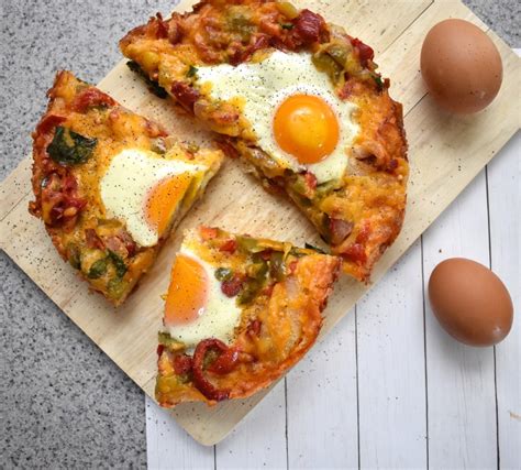 Egg pizza. Instructions. Preheat oven to 425 degrees F (218 C) and position a rack in the middle of the oven. Bring large skillet to medium heat. Once hot, add 1 Tbsp olive oil (amount as original recipe is written // adjust if altering batch size), onion and peppers. Season with salt, herbs and stir. 