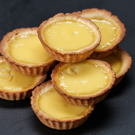Egg tarts. Melt butter in a medium skillet over medium heat. Add shallot and cook, stirring occasionally, until softened, 1 to 2 minutes. Add spinach and cook, stirring, until wilted, 4 to 5 minutes; cool. Step 2 Whisk together eggs and cream in a bowl. Season with salt and pepper. 