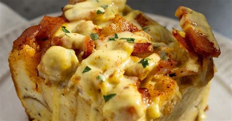 An eggs benedict casserole is perfect for a large group because it has all the flavors of a traditional eggs benedict (like English muffins, Canadian bacon, and a rich eggy sauce) but with a lot less work. You can prep it the night before in a large casserole dish and bake it the next morning.. 