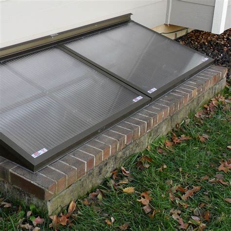 Egress window well cover. Rectangular Sloped Window Well Covers Outside 50" W x 40" L – Basement Window Well Covers, Screen for Windows and Splash Guards Window, Polycarbonate Egress Outdoor Space & Crawlspace $249.99 $ 249 . 99 